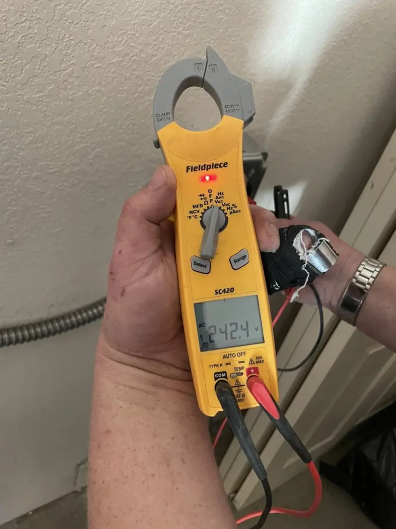 Voltage testing with clamp meter during Generator Installation in Chowchilla